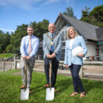 Cutting the sod on the £6.1m refurbishment of Carnfunnock Park, the Mayor of Mid and East Antrim, Councillor Jackson Minford is joined by project funders, Ryan Donaghy and Jenny Martin of the Ministry of Housing, Communities and Local Government.