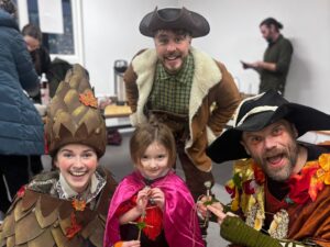 Families enjoying The Wandering Stick’s Festive Adventure at Gortin Glen Forest Park.