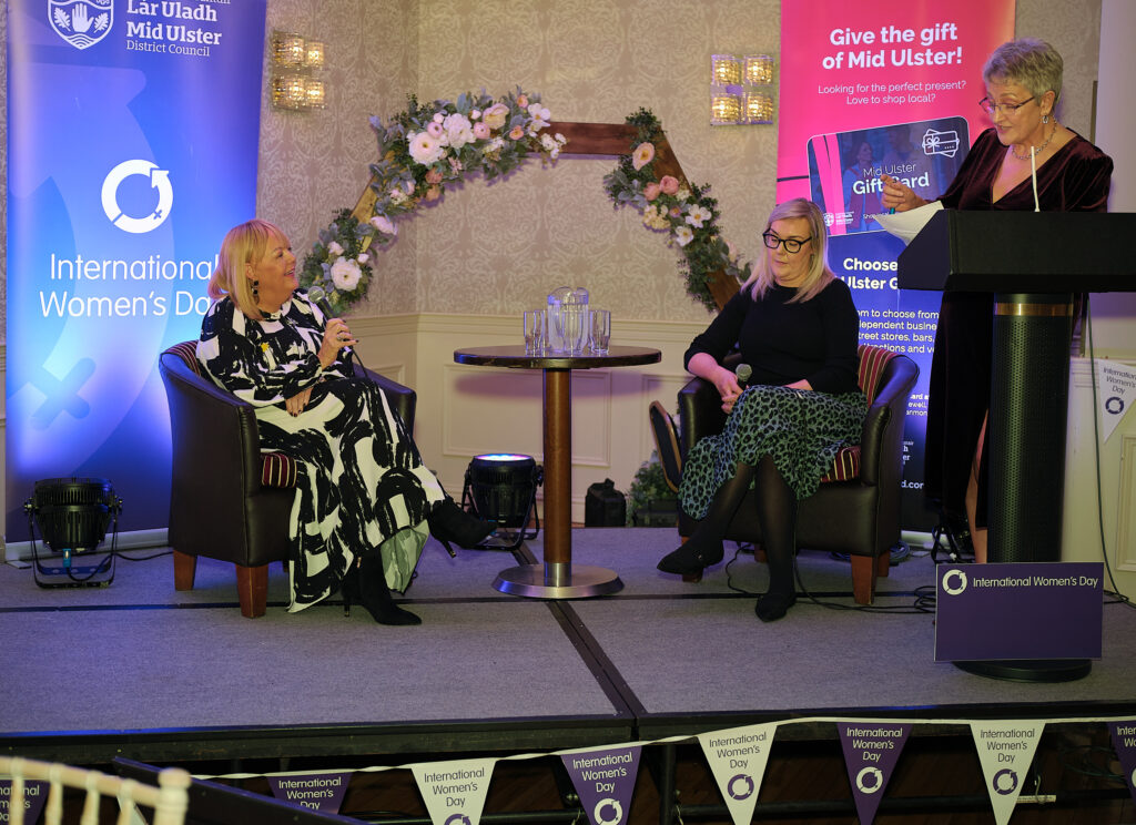 MC Carol Doey interviews Sheena Havlin from Marie Curie and Nichola Simpson from Causeway and Mid Ulster Women’s Aid on stage during the Council’s International Women’s Day event.