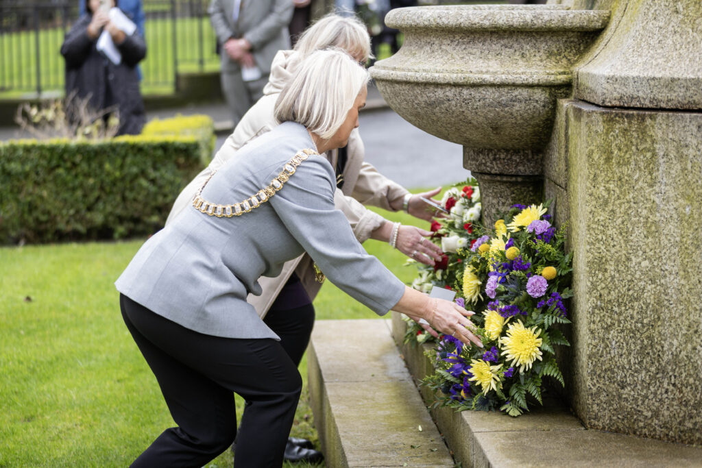 Lord Mayor, Councillor Tracy Kelly lays a wreath at the Titanic Memorial statue in the grounds of Belfast City Hall, alongside Susie Millar, President of Belfast Titanic Society.