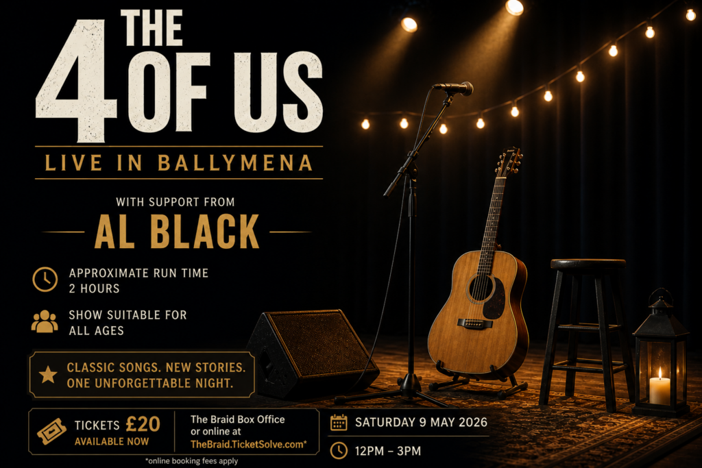 live music performance with acoustic guitar and stage lighting in a concert venue