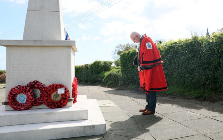 The Mayor of Mid and East Antrim, Councillor Jackson Minford lays a wreath in tribute to those killed during the Blitz
