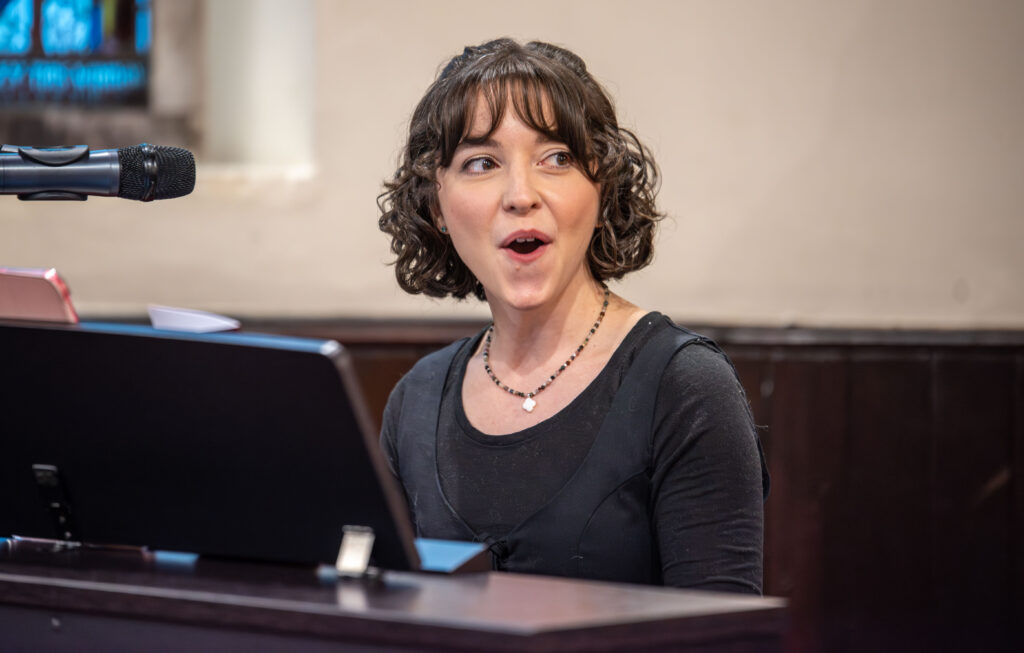 Lisa Dawson singing as part of the performance.