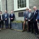 Communities Minister Gordon Lyons is pictured at the unveiling of the UNESCO plaque at Gracehill along with (L-R) Sarah Groves, former Bishop of Gracehill Moravian Church, outgoing Deputy Mayor, Councillor Tyler Hoey, outgoing Mayor of Mid and East Antrim, Councillor Jackson Minford, Alderman William McCaughey, Alderman Thomas Gordon, Her Majesty’s Lord Lieutenant Mr David McCorkell and Chair of Gracehill Old School Trust, Dr David Johnston OBE.