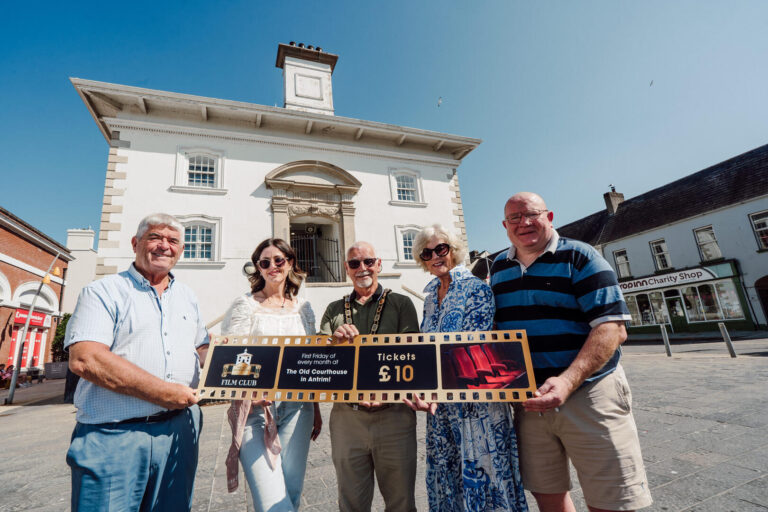 Councillor Billy Webb MBE JP , Councillor Lucille O'Hagan, Mayor of Antrim and Newtownabbey Henry Cushinan, Noreen McClelland and Councillor Neill Kelly celebrating the new film club.