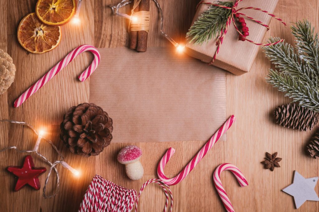 Illustrative Christmas wrapping and seasonal decorations; not the actual Made in AND event or merchandise.