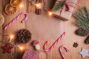 Illustrative Christmas wrapping and seasonal decorations; not the actual Made in AND event or merchandise.