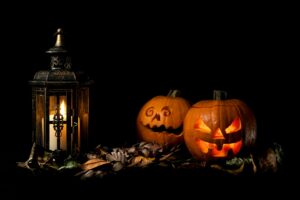 Illustrative Halloween pumpkins and lantern; not a photograph of the Purple Turnip Festival.